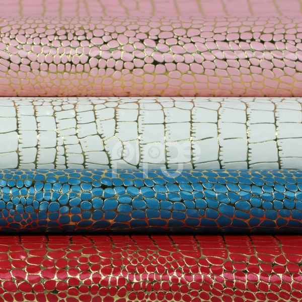 ·七彩龙纹布底PU革0.6厚度 用于制作烟酒盒 眼镜盒等产品