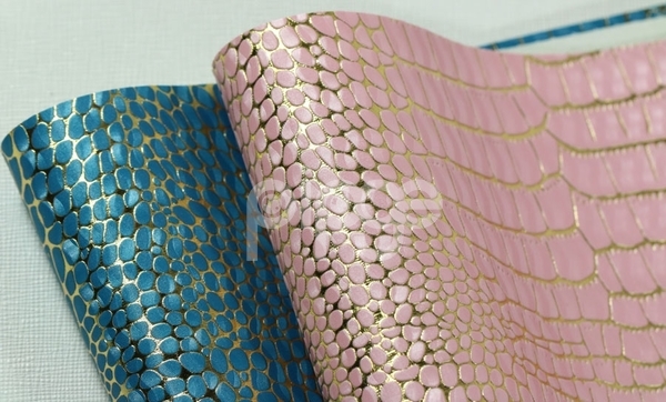 ·七彩龙纹布底PU革0.6厚度 用于制作烟酒盒 眼镜盒等产品